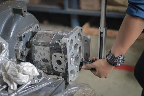 Close up Assembly and installing Gear pump Stock Photos