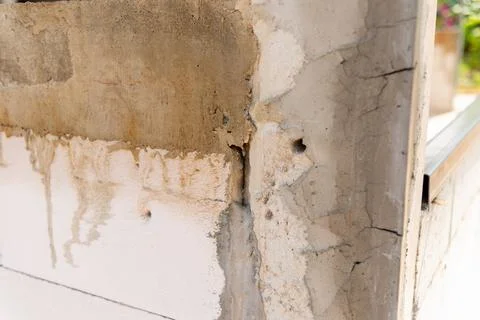 Close-up assessment of structural damage in urban residential areas repair .. Stock Photos