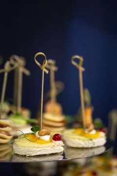 Close-up of assorted canapes on a glass surface Stock Photos