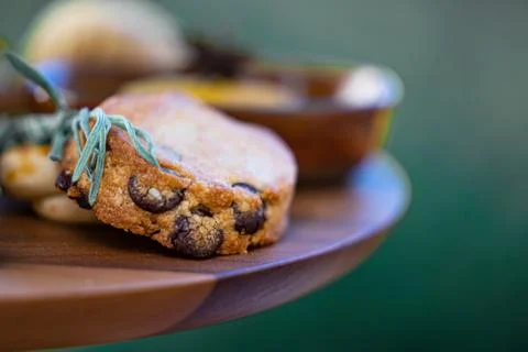 Close up of assorted cookies on tray with nuts and chocolate pieces Foto stock