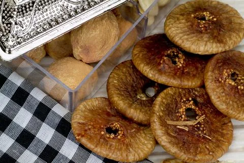 Close-up of assorted dry figs and apricots. Stock Photos