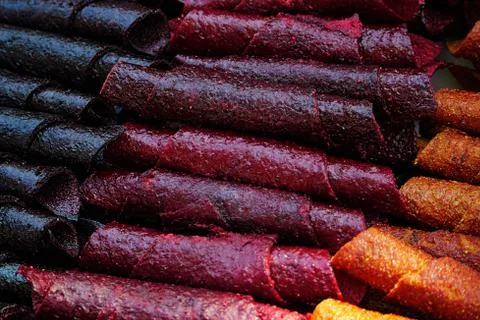 Close-up assorted fruit candies on the table. Luxury handmade sweets. Vegan Stock Photos