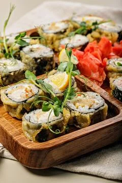 Close-up assorted hot rolls with eel, Japanese omelet, cream cheese, fried on Stock Photos