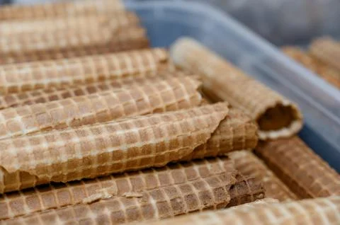 Close-up of assorted ice cream cones stacked in a container Stock Photos