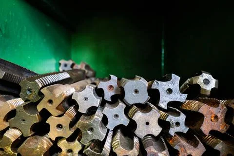 Close-up of assorted metalworking tools stored in a workshop focusing on Stock Photos