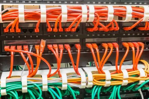 Close up of assorted network cables connected to switch Stock Photos