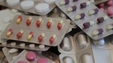 Close-Up of Assorted Pills and Medications Stock Footage 341126816