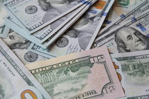 Close up of assorted US dollar banknotes representing money Stockfoto's