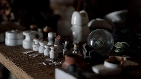 Close-up of assorted vintage ceramic electrical insulators, sockets, and small Stock-Footage 320685948