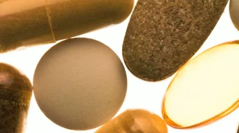 Close up of an assortment of vitamin pills Видео 20544904