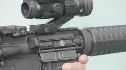 Close Up Assualt Rifle Shoot, .223 Ammo NATO 5.56mm Self Defense Protection Gun Stock Footage 129486653