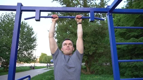 Close up of an athlete performing pull ups Stock Footage 89451652