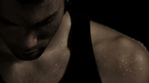 Close Up of Athlete's sweaty face looking up Stock Footage 33831069