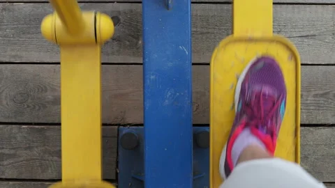Close-up of athletic legs running on a walking simulator. Stock Footage 122976948