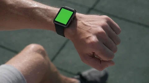 Close up of an Athletic mans hands with smartwatch green screen chroma key. Stock Footage 94917020
