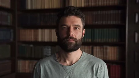 Close Up of Attractive Beard Man With Kind Eyes Looking At The Camera Stock Footage 152567849