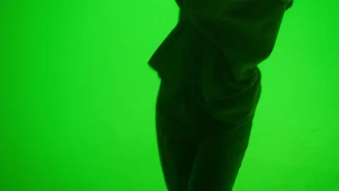 Close-up of attractive dancer on coloured changing neon background in studio Video stock 156057698