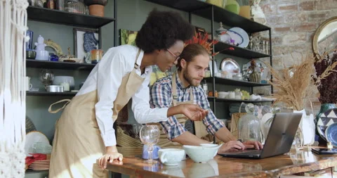 Close up of attractive purposeful in good mood young mixed race coworkers which Stock Footage 143964684