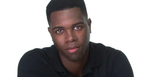 Close up of attractive young black man looking at camera Video stock 42656072