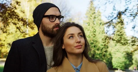 Close up of attractive young romantic couple in live hugging and dreaming in the Stock Footage 82510107