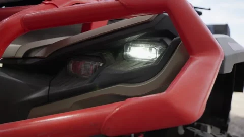 Close-Up of ATV Headlight with Red Protection. 動画素材 311619131
