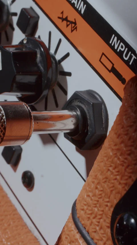 Close Up of Audio Cable Inserted into Retro Style Amplifier Vidéo 342454375