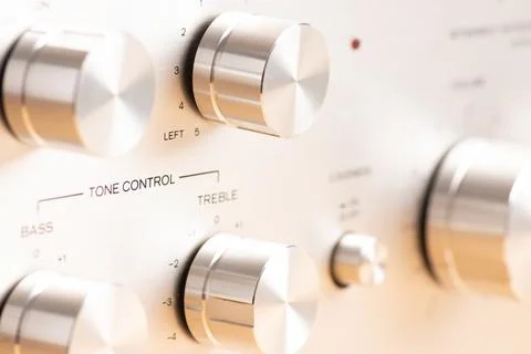 Close-Up of Audio Equipment Control Panel with Metal Knobs and Labels Stock Photos