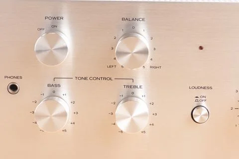 Close-Up of Audio Equipment Control Panel with Metal Knobs and Labels Stock Photos