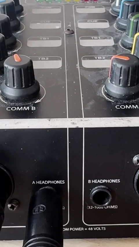 Close-up of an audio intercom panel with communication knobs, headphone ports Stock-Footage 337231599