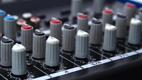 Close up of an audio mixer knobs - mixing console control desk Stock Photos