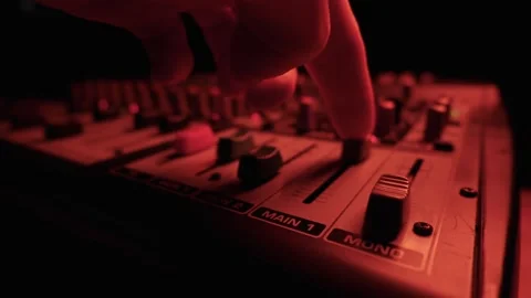 Close Up of Audio Mixing Console Faders Under Purple Studio Lights Stock Footage 334736697