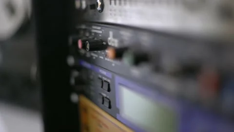 Close up of audio recording device with knobs and switches. Equalizer and 動画素材 143383831