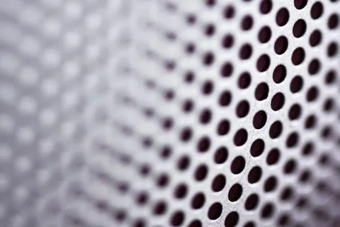 Close up of audio speaker grill pattern background Stock Photos