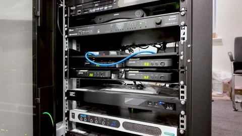 Close-up of an audio visual equipment rack system in a meeting room The rack Stock Footage 328089534