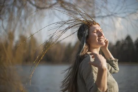 Close up authentic lady with crown squinting in bright sunlight portrait pict Stock Photos