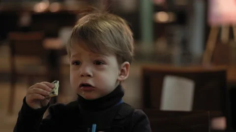 Close-up of authentic two minor preschool siblings child boy and girl kids in a Stock Footage 148685112