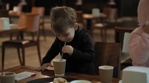 Close-up of authentic two minor preschool siblings child boy and girl kids in a Stock Footage 148689135