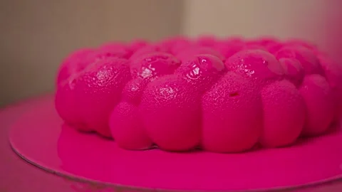 Close-up of the author's pink cake Stock Footage 266431328