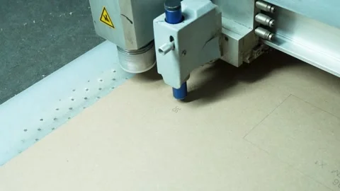 Close-Up of Automated CNC Machine Drawing Pattern on Material Stock Footage 322057661