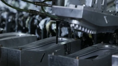Close up automated manufacturing of rubber soles Stock Footage 82118958