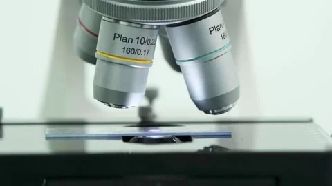 Close-up of an automated scientific laboratory microscope. Stock Footage 269295590