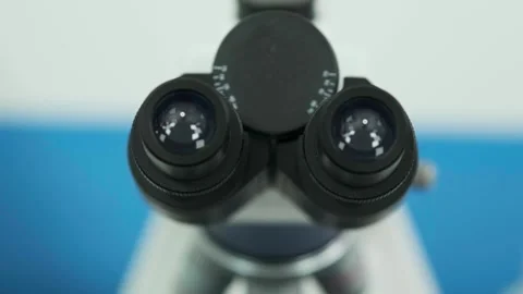 Close-up of an automated scientific laboratory microscope. Видео 269296066