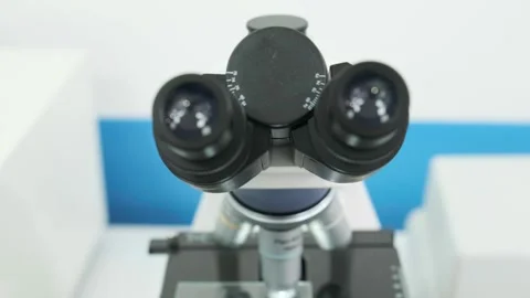 Close-up of an automated scientific laboratory microscope. Видео 269305504