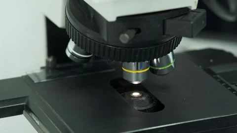 Close-up of an automated scientific laboratory microscope. Видео 269348580