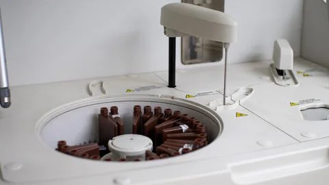 Close-up of an automatic biochemical blood analyzer in a laboratory. The device Stock Photos