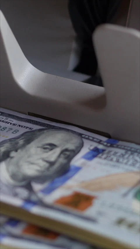 Close-Up Of Automatic Cash Counting Machine For 100 Dollar Bills. Machine Counti 動画素材 284344428