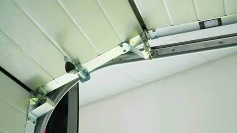 Close-up of the automatic closing of the garage door. Stock Footage 313234983