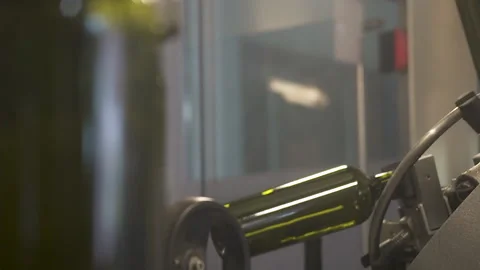 Close-up. Automatic conveyor with moving bottles on the belt, Stock Footage 155425837