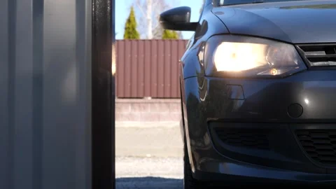 Close-up automatic gates on a remote control open before entering the courtyard Video stock 267718356