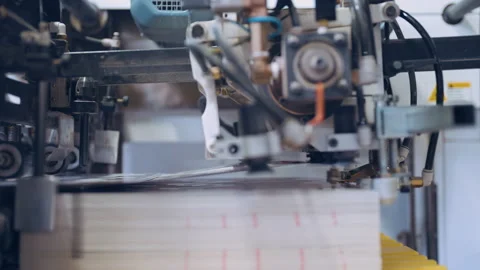 Close up, Automatic line for printing and cutting in the printing house. Stock Footage 197463622